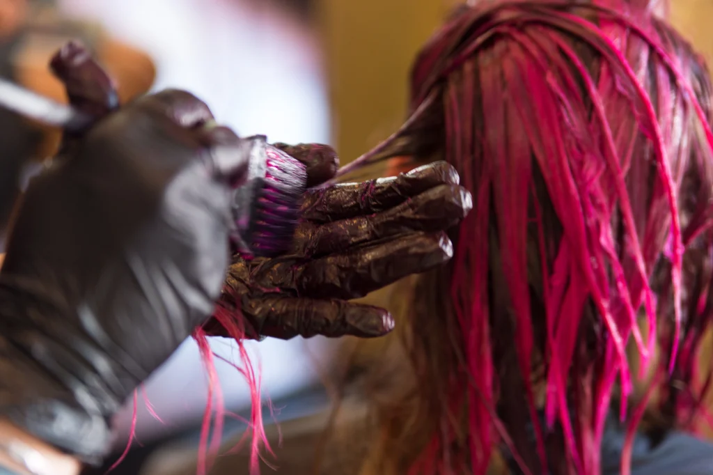 Hair Dresser Dying A Woman S Blond Hair Pink 2023 11 27 05 31 52 Utc